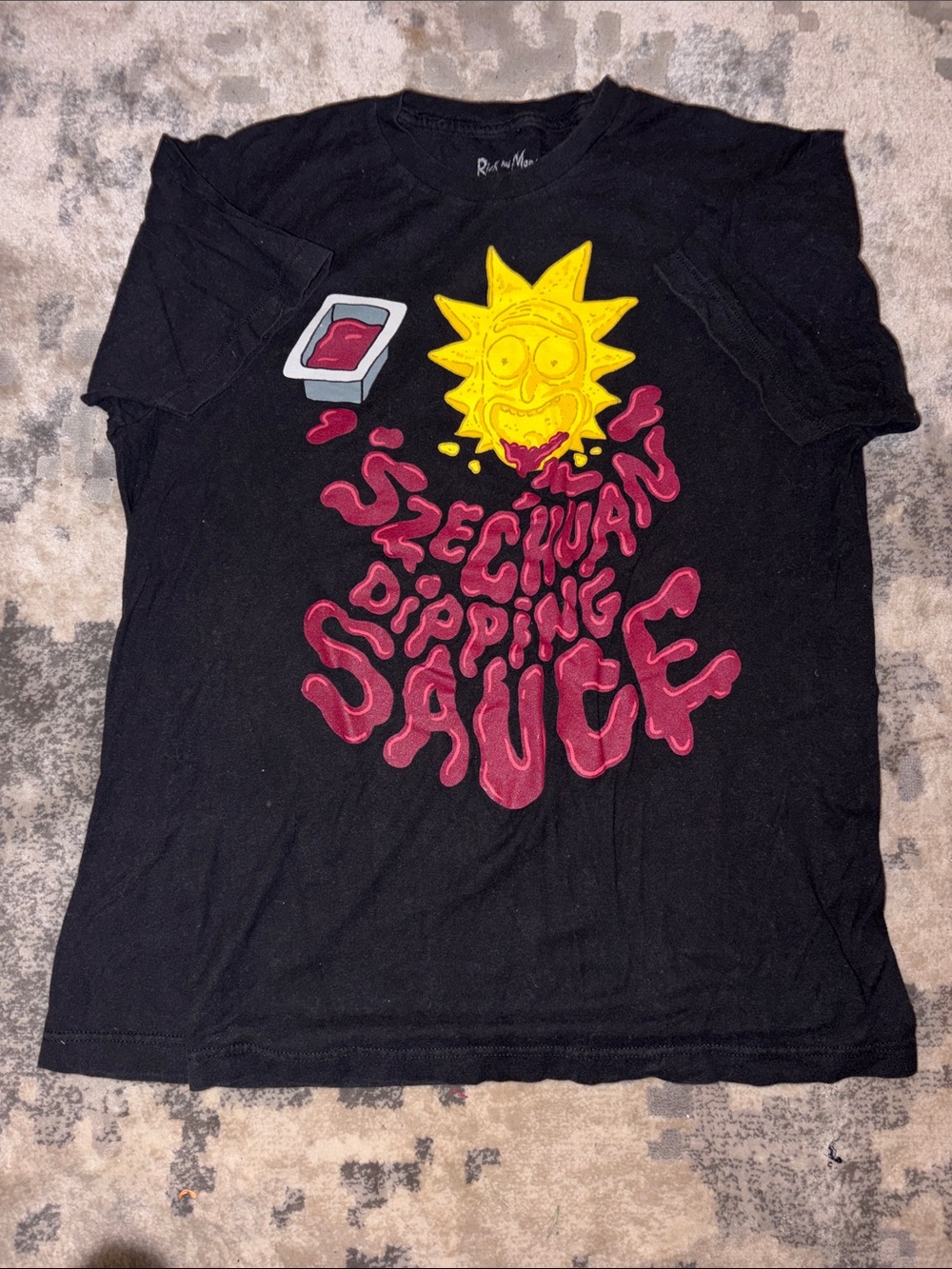 Black Graphic Short Sleeve Tee with Yellow & Red Cartoon Artwork